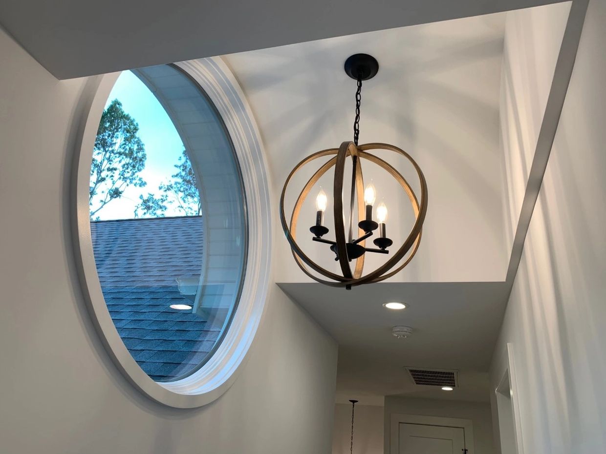 Circle window with chandelier