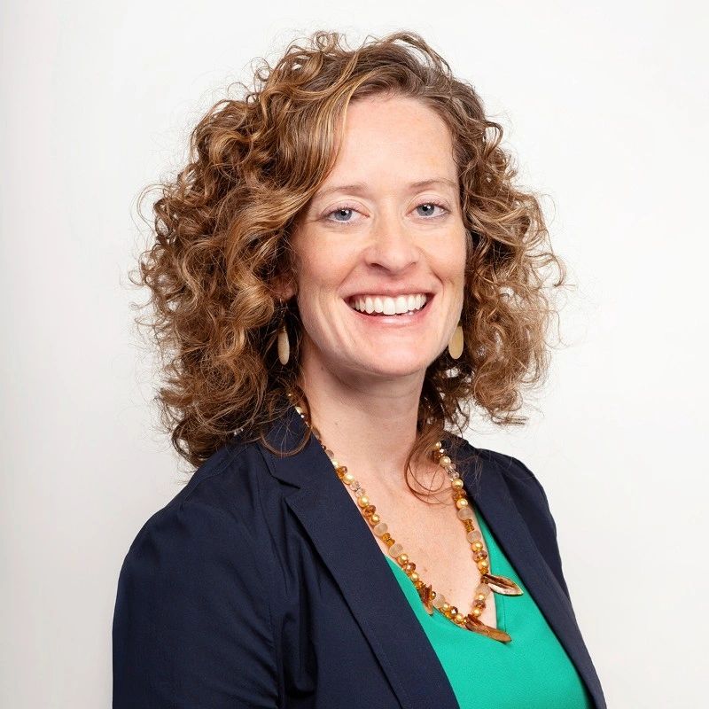 Person smiling in a professional photo