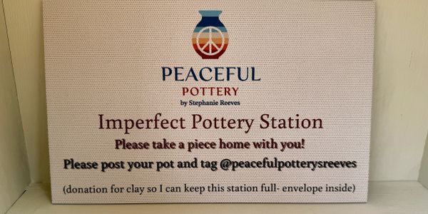 Sign inviting people to take pottery and share on social media.