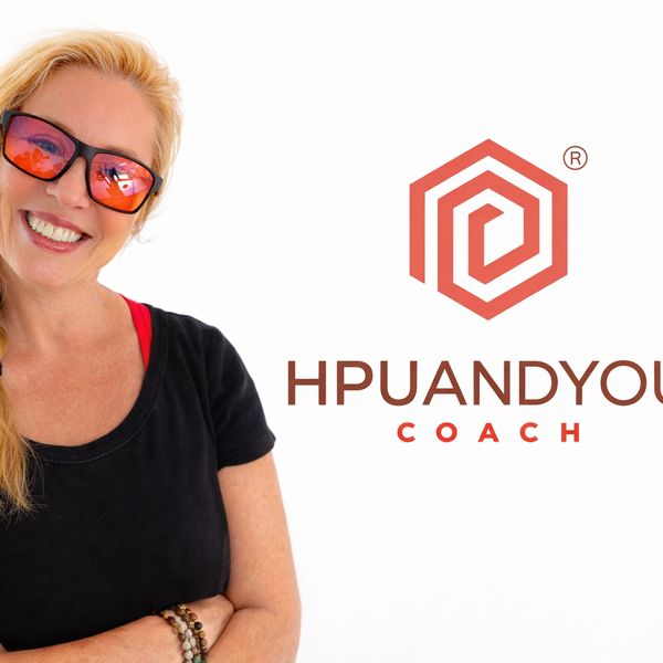 Smiling woman with sunglasses next to a coaching logo on white background.