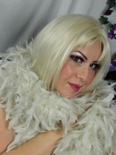 Our Miss Sierra - as a blonde - covering herself with one of about 10 feather boas.