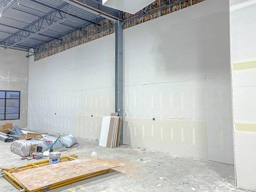 Commercial warehouse drywall and taping services in Lake in the Hills, IL plastering contractor