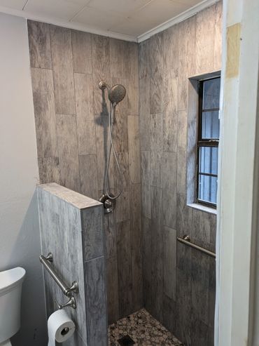 Removed tub and put in custom handicap accessible walk-in shower.