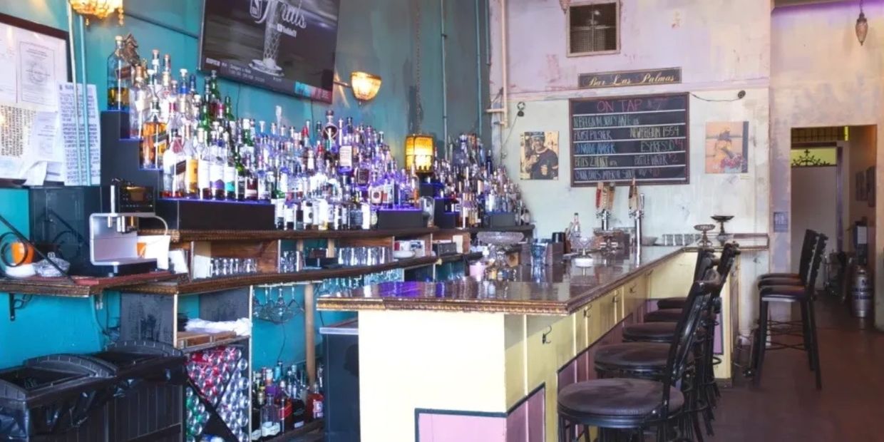 The long bar and Cantina vibe at Bar Las Palmas