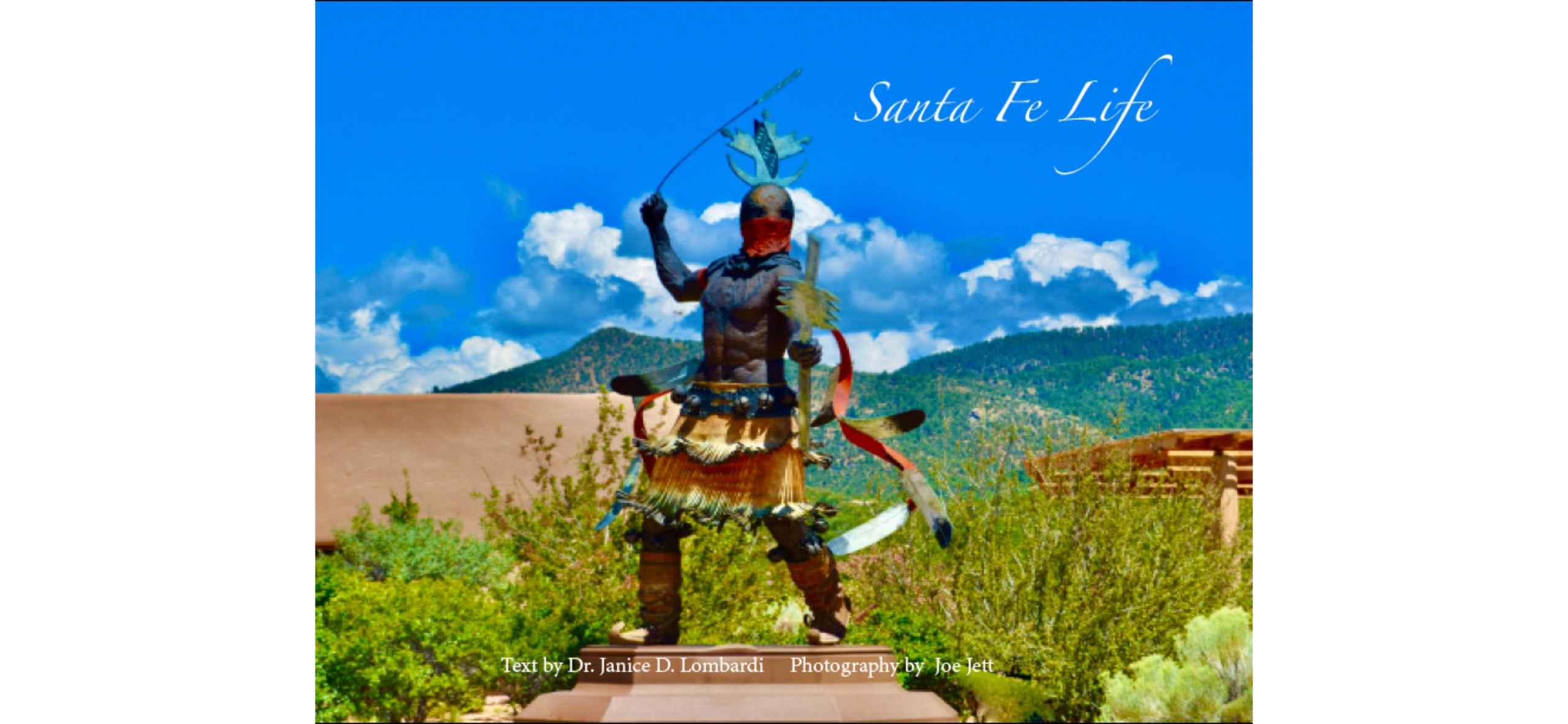 Statue of a Native American warrior against a scenic mountain backdrop in Santa Fe.
at Museum Hills Museums
