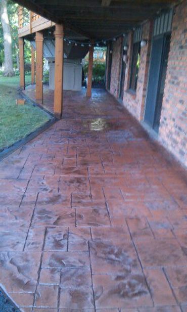 Ashlar Slate Stamped Concrete Patio, copper color, medium gry release.