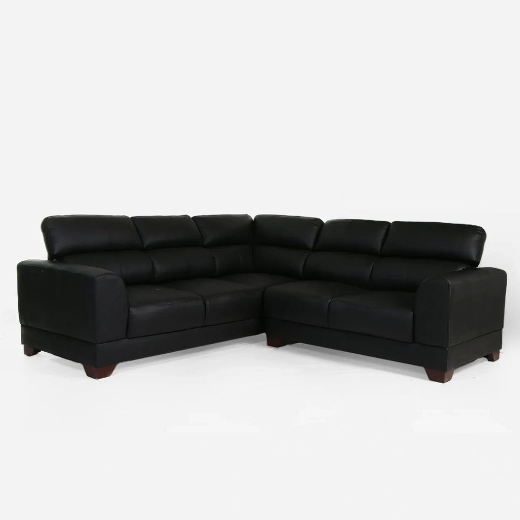 Black leather L-shaped sectional sofa.