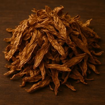 A pile of dried brown pods on a wooden surface.
