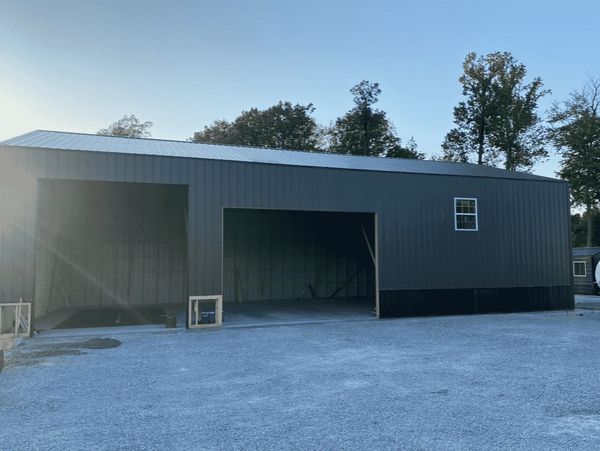 Pole barn build in Owensboro, KY with carpentry and concrete construction by KAR-GAL Construction.
