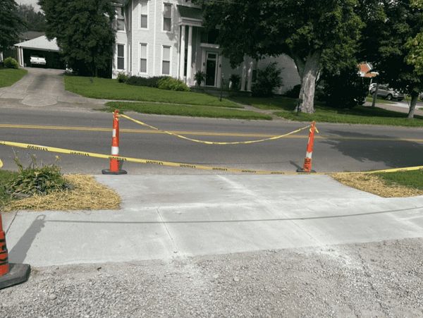 Concrete driveway demo and installation in McLean County, Kentucky by KAR-GAL Construction.
