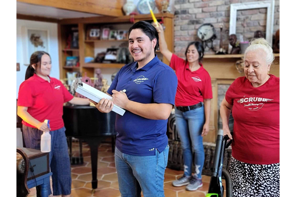 Cleaning team smiling to camera