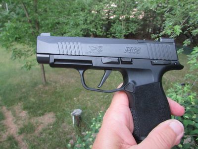 The Sig Sauer P365 XL is a great concealed carry gun with 13 rounds and compact size. 