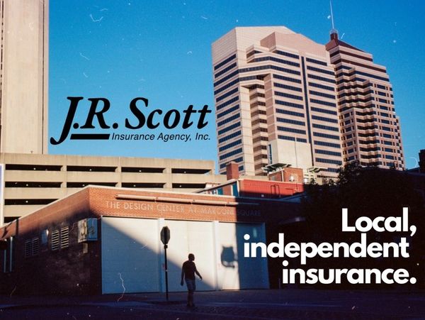 Downtown Columbus, Ohio. Shadows on the buildings. J. R. Scott Insurance Agency. Local, independent.