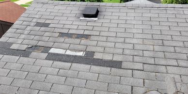 Wind damaged Shingles Livonia Michigan