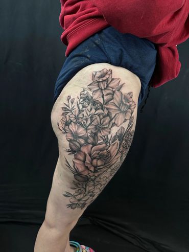 Thigh tattoo