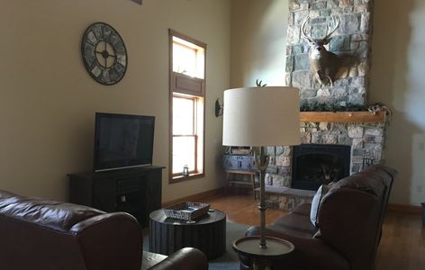 Fireplace, deer mount, Bucktail Lodge