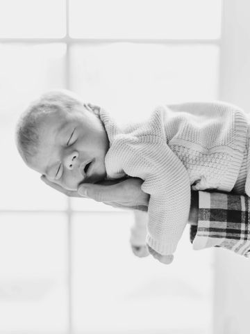 Newborn session.
Newborn baby pose.