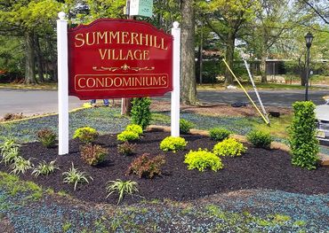 Summerhill Village condominium complex planting beds with stone wall