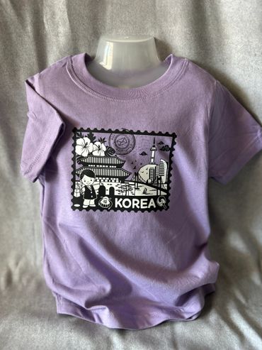 Purple T-shirt with Korea-themed graphic design.