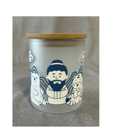 Frosted glass jar with wooden lid featuring cartoon man and animals design.
