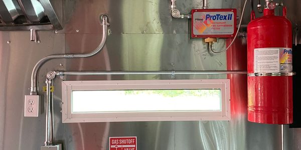 kitchen hood fire suppression system installed. Certified ProTexII fire suppression distributor