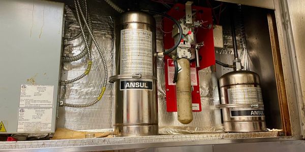 Ansul kitchen hood fire suppression system in kitchen hood system cabinet