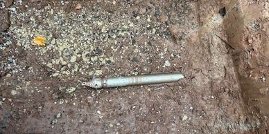 impact mole entering receiving pit. Creating new bore hole for new water supply pipe. Trenchless.