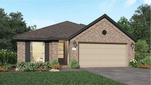 Brick house with a two-car garage and front garden.