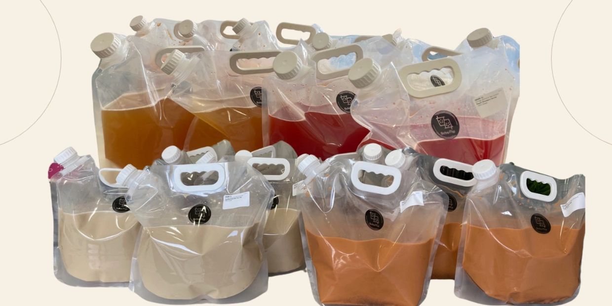 milk tea and flavored tea in jugs