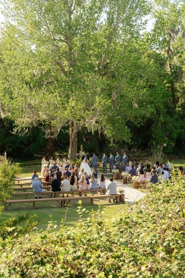 outdoor wedding ceremony at The Mulberry estate gardens in new smyrna beach florida