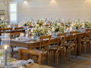 pale yellow, light blue, sage green and white floral reception farm table centerpieces