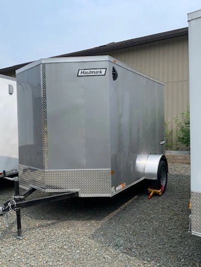 Haulmark Passport Deluxe 6x10 enclosed utility trailer, silver with ramp