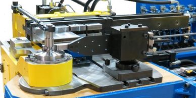 Image of a Tube Works swing away wiper which is on a CNC tube bender.