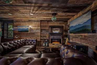 Reclaimed wood walls in basement lounge