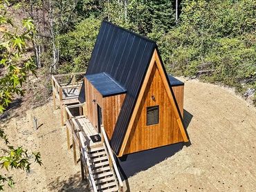 a frame cabin in the woods