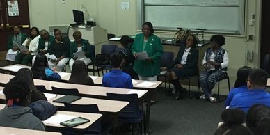 Psi Chapter Members review careers with college students at SMU.