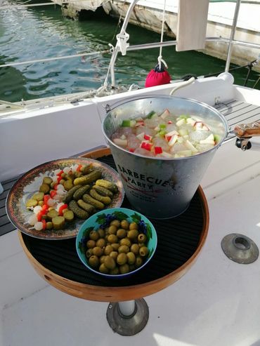 Complimentary snacks and drinks aboard sailing yacht charter boat Furia 32 in Estepona