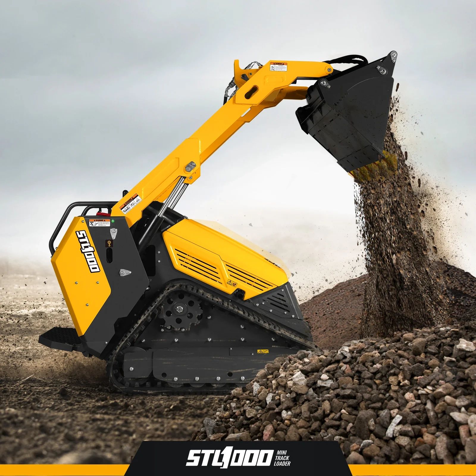 Yellow STL1000 mini track loader dumping soil on a construction site. machinery