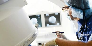 Pain management doctor performing procedure