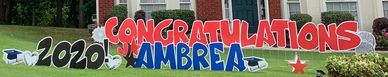 Large yard sign congratulating Ambrea on graduating in 2020.