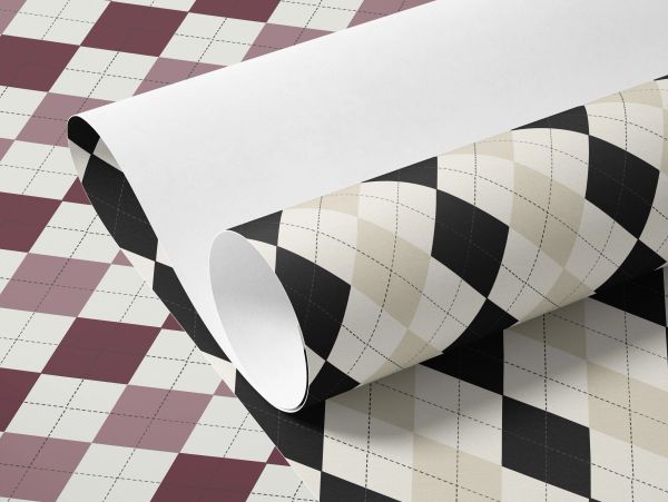 Rolled wallpaper with black and beige argyle pattern.