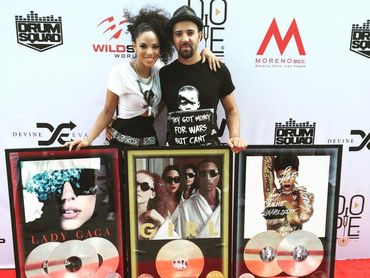 Devine and Day'nah Cooper-Evans presented with 3 RIAA Certified plaques