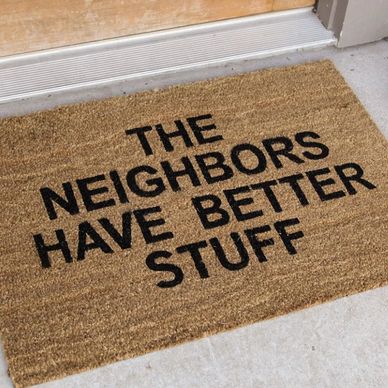 Funny door mat at residential house
