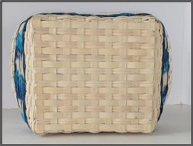 Woven basket with blue and black accents.
