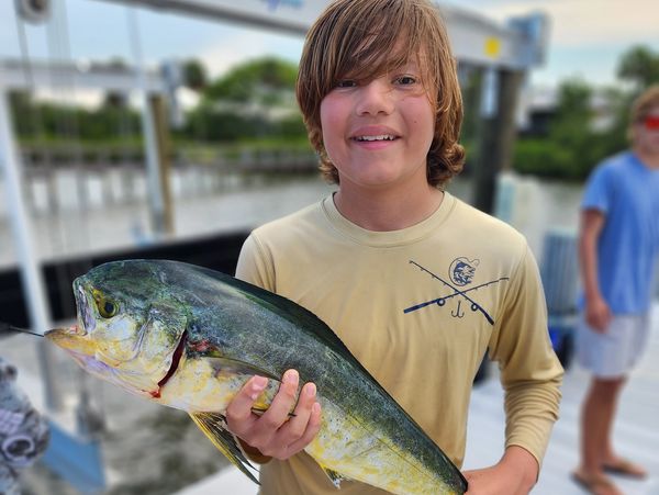 Hooks of Hope Kid with Mahi. Helping children with fishing. Vero Beach, FL