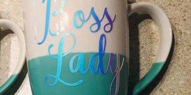 Ceramic mug with iridescent vinyl Boss Lady decal.