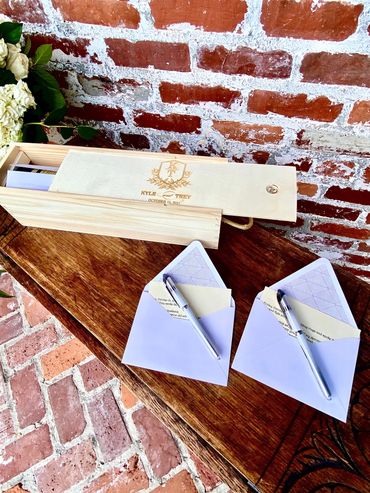 Signing and placing wedding vows in letter box during a unity ceremony in Orlando, Florida.
