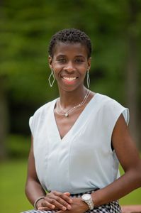 Beautiful African-American black woman short hair smile headshot headshots realtor real estate