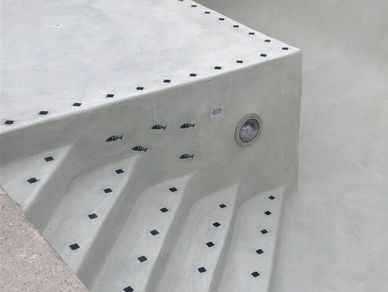 Pool tile work. Pool floor decor. Shapes on pool tile. Different look for pools.