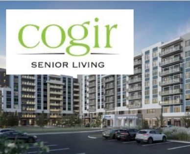Modern senior living complex by Cogir with ample parking and greenery.